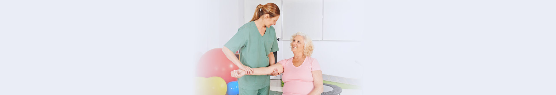 Woman with aching shoulder in physical therapy